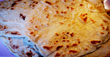 طريقة عمل الخبز العربي في البيت من غير فرن