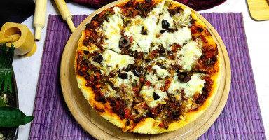 طريقة عمل البيتزا باللحمة المفرومة