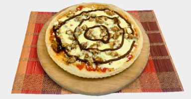 تقديم بيتزا الدجاج بصوص الباربكيو