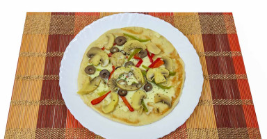 تقديم بيتزا المقلاة